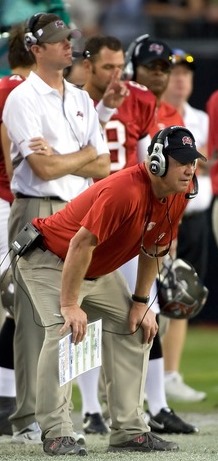 Embattled Bucs defensive coordinator Jim Bates watches his dismal defense set a Bucs franchise record yesterday.