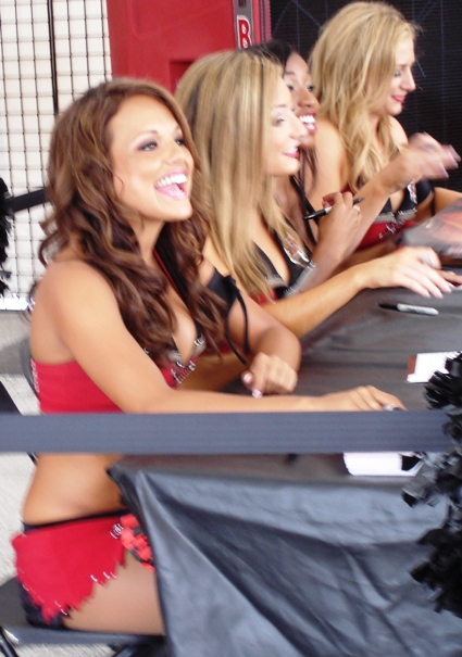 The lovely Tiffany Jimenez, foreground, one of Joe's favorites, laughs with a fan Sunday. This is Tiffany's final training camp as a Bucs cheerleader. Hopefully she'll be working TV with her camera personality and on-air presence.