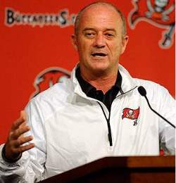 The heat is already on Bucs offensive coordinator Jeff Tedford, says a local columnist.
