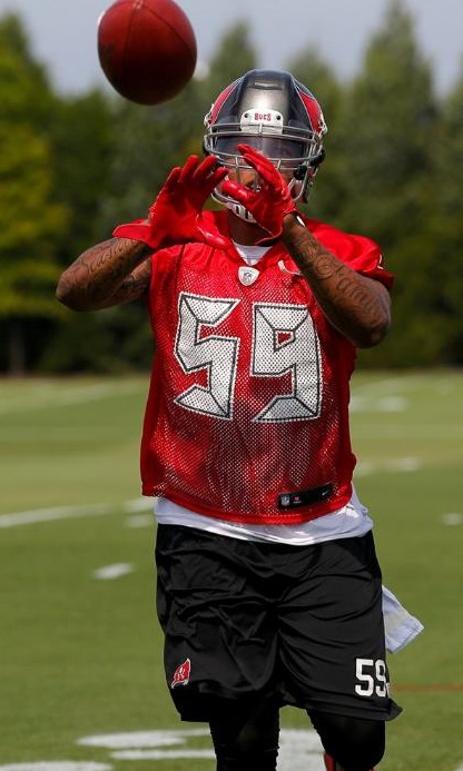 Bucs icon and current linebackers coach Hardy Nickerson weighs in on shrinking Mason Foster. Photo courtesy of Buccaneers.com.