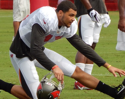 Mike Evans and his teammates tried to stay loose and dry during a rainy practice at One Buc Palace this evening. 