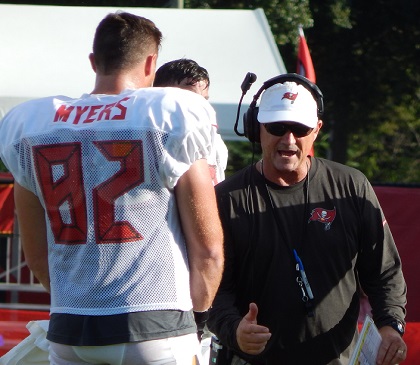 During offseason practices, Jeff Tedford used to coach players up passionately through water breaks. That's what was happening in this photo.