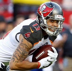 Bucs WR Mike Evans offers thoughts on who should win NFL "Rookie of the Year" and who the Bucs should draft at No. 1.