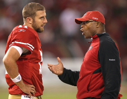 Former 49ers coach Mike SIngletary, right, watched first-hand how former college spread-option QB Alex Smith, left, struggled terribly trying to get a handle with NFL offenses.