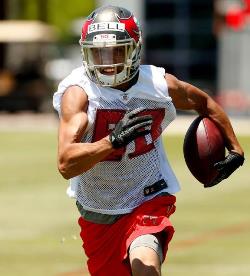 Bucs WR Kenny Bell goes for some YAC in Bucs rookie minicamp Friday.