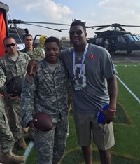 America's Quarterback hangs with America's Finest in Hawaii.