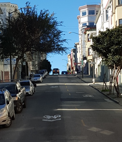 One of the steep hills of San Francisco while gliding through the city on a cable car.