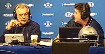 Pat Kirwan listens to a point being made by co-host Jim Miller during a broadcast of "Movin' the Chains" heard exclusively on SiriusXM NFL Radio.