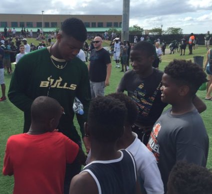 America's Quarterback signs autographs for fans at the Univeristy of South Florida spring game Saturday.