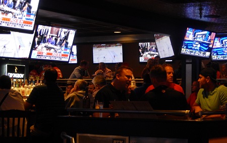 The night rolls on at Joe's 2016 NFL Draft party at Draft Picks in Clearwater. View of west side of bar.