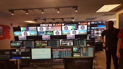 Entrance to the stadium's video control room. There are three rows of monitors where some 40 workers will select video from and then display onto the stadium videoboards. The monitors carry video from both the 16 cameras in the stadium but also video of games and other happenings from around the globe.