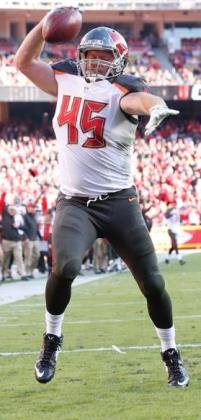 Bucs' TE Alan Cross celebrates his first NFL touchdown catch.