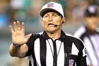 Referee Ed Hochuli signals a pass interference penalty during a preseason NFL football game between the Pittsburgh Steelers and the Philadelphia Eagles, Thursday, August 21, 2014 in Philadelphia. The Eagles won the game 31-21. (AP Photo/Paul Jasienski)